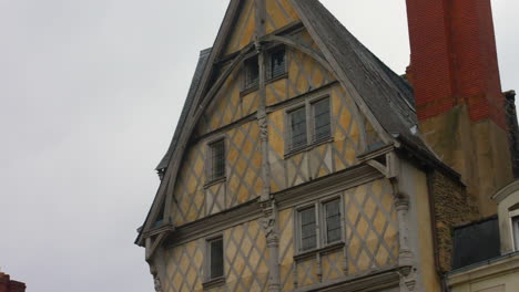 house of adam, old half-timbered house in the city of angers, france - low angle