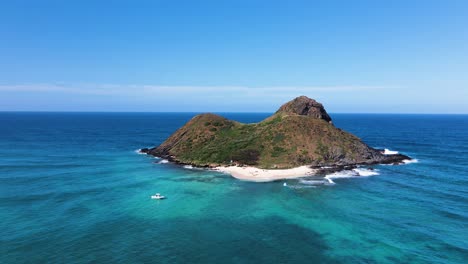 Aerial-track-shot-of-Mokulua-Island-with-sandy-Lanikai-Beach,-blue-sky-and-sunny-day