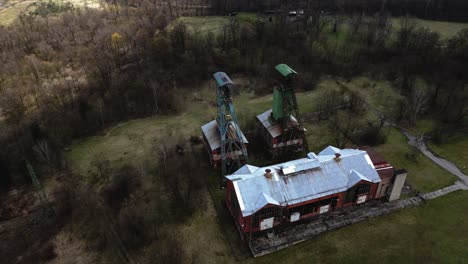 shot of the towering structures of the gabriela coal mine, now closed, near karviná