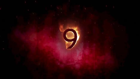 Animation-of-9-text-in-burning-flames-over-dark-background