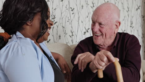 elderly man with caregiver