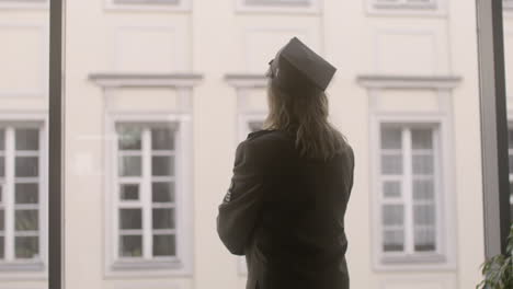 woman looking out of the window