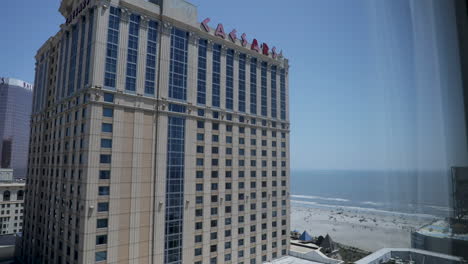 caesar's casino and hotel - building during the day with beach in background - atlantic city, nj