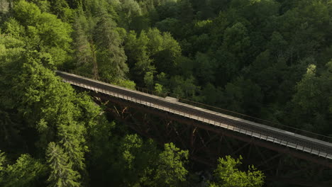 railroad of eiffel bridge on steep forest mountains between borjomi and bakuriani valley in georgia