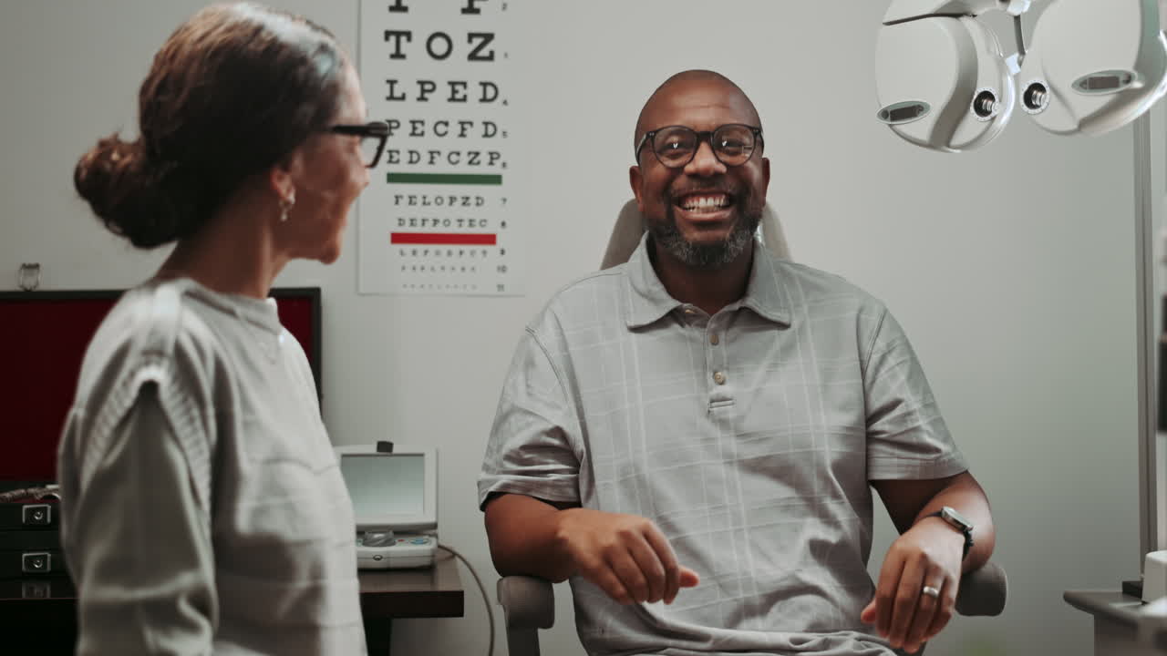 A man and a woman at an eye exam