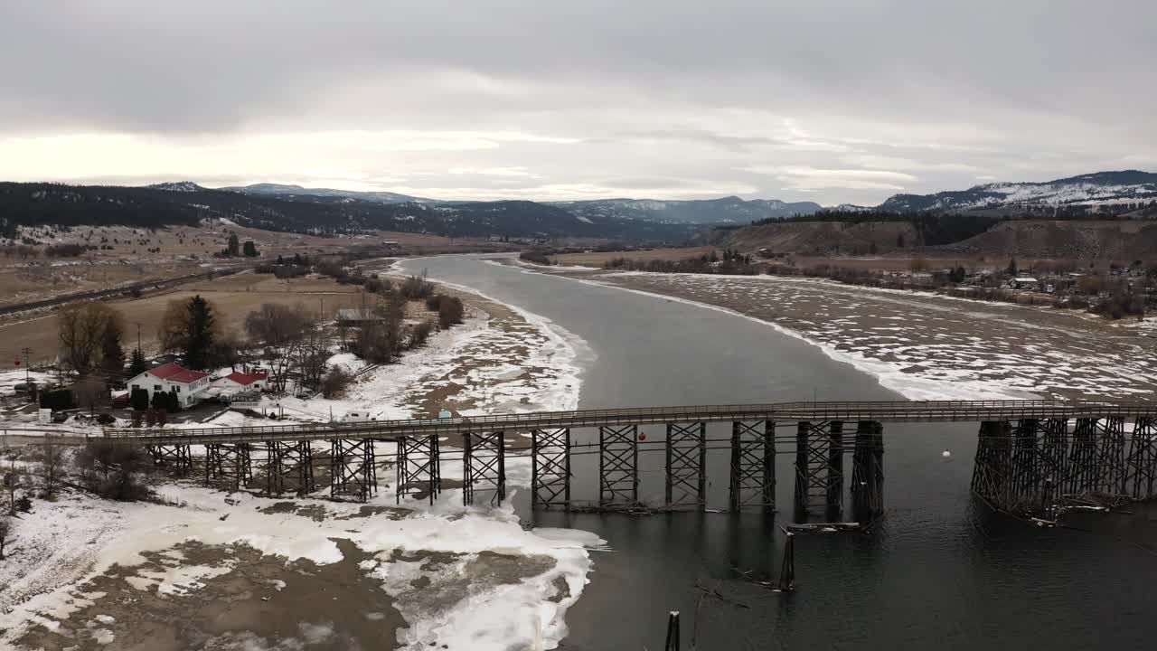 The Wooden Structure of the Pritchard Bridge in a Majestic Winter Landscape
