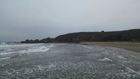 waves-at-Huaquen-beach,-located-in-the-region-of-Valparaiso,-country-of-Chile