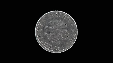 germany 50 reichspfennig 1940 obverse with eagle and swastika, macro loop on black background