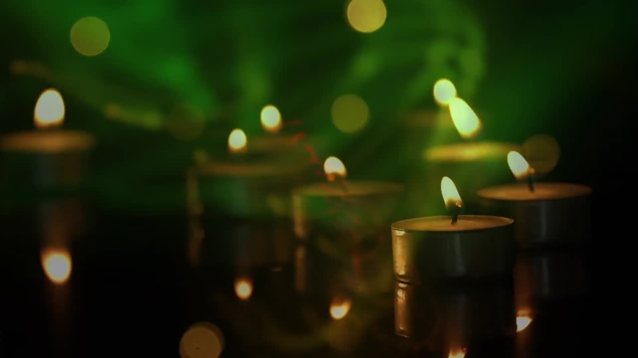 animación de velas de luz de té con manchas de luz parpadeantes