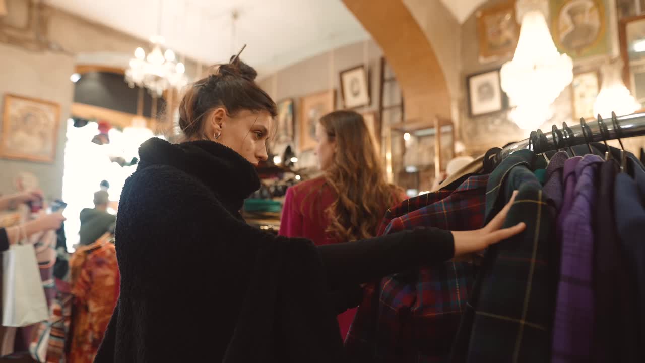 Woman Shopping for Clothes at a Vintage Store