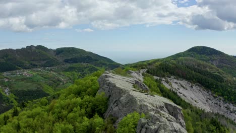 zipline drone shot of belintash plateau that is believed to be a cult site used for ritual purposes by tribes inhabiting the areas around rhodope mountains in plovdiv in bulgaria