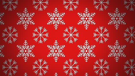 animation of christmas decoration pattern with snowflakes moving in formation on red background