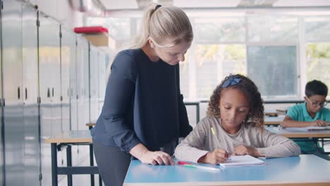 friendly female school teacher giving help