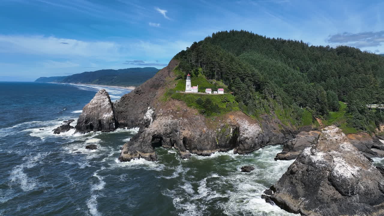 Aerial view toward the Heceta head lighthouse, sunny day in Oregon, USA
