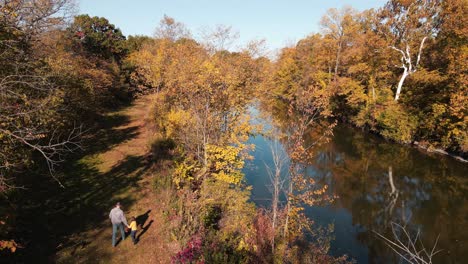 Unrecognizable-people-in-Oakwoods-Metro-Park,-Wayne-County-Michigan-next-to-Huron-River,-aerial-view