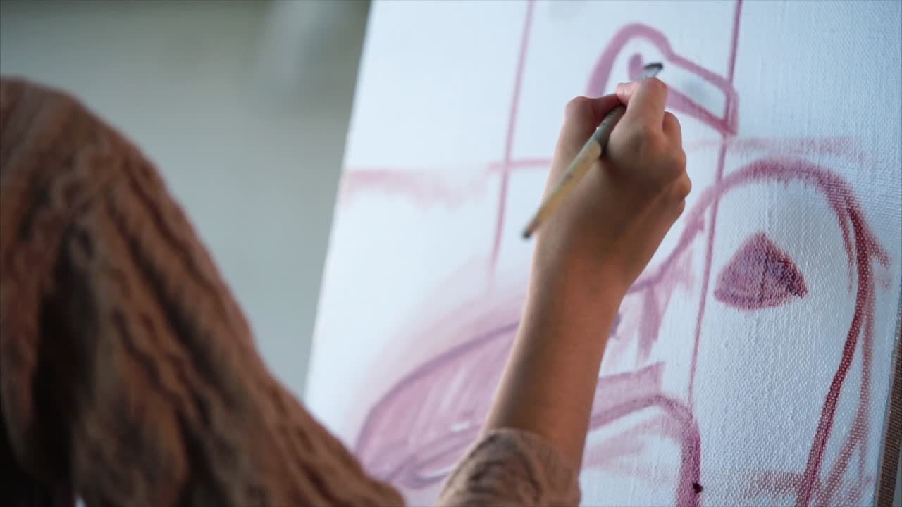 Woman Painting on Canvas