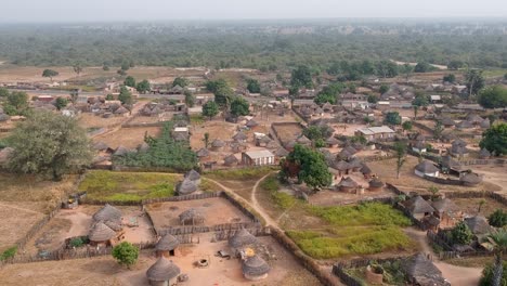 drone shot of thatched roof traditional village in senegal africa