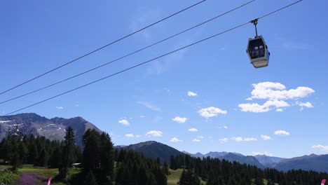 cable car moving over scenic mountain landscape