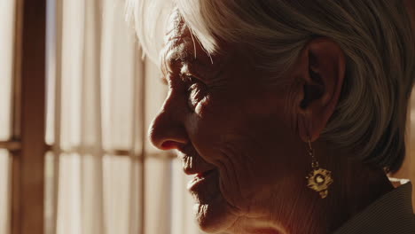 elderly woman by a window