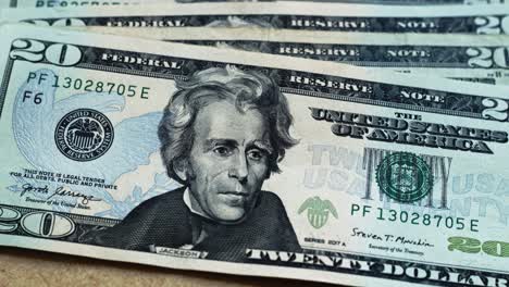 focus in a bunch of 20 dollar bills usds andrew jackson 4k