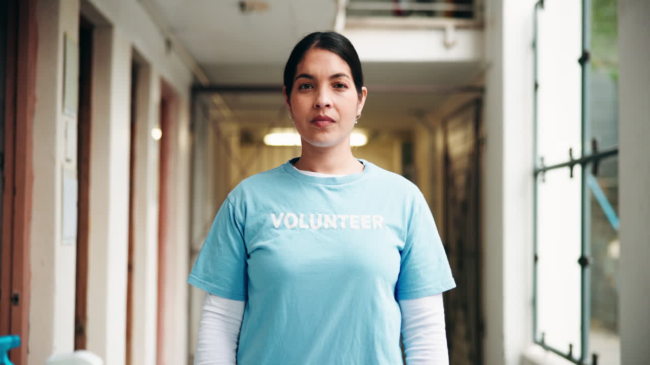A woman volunteering in a hallway