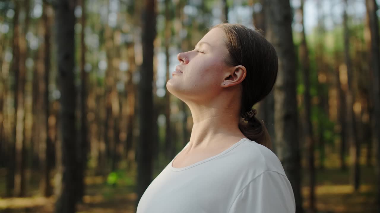 Woman Relaxing in Forest