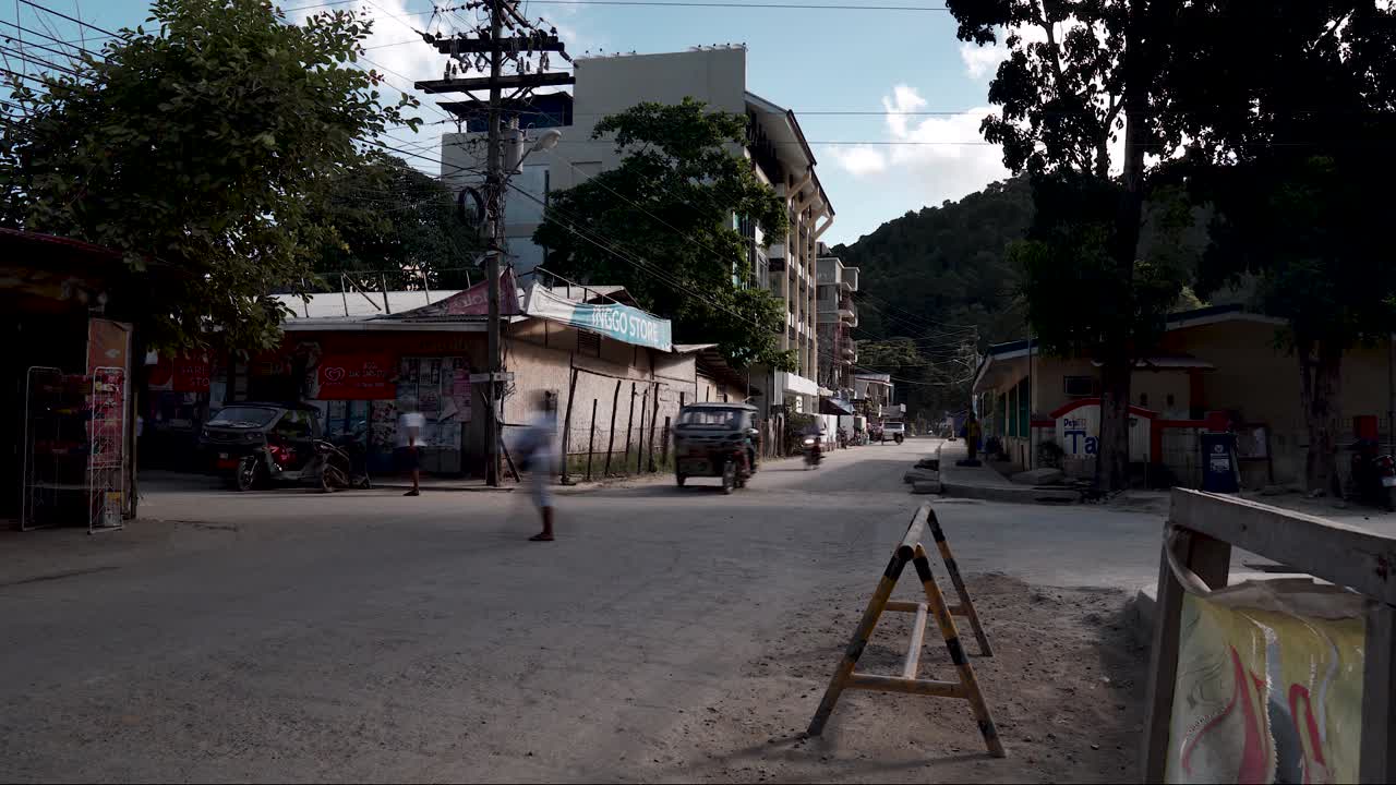 Timelapse of motor vehicles at an intersection with heavy traffic in El Nido, Palawan (Philippines)