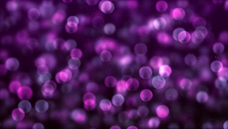 video de fondo: círculos púrpuras brillantes sobre una superficie oscura