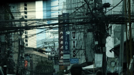 overcrowded street scene with electrical wires in manila