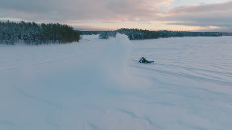 tractor snow blower clearing norbotten lapland ice drifting racetrack aerial view