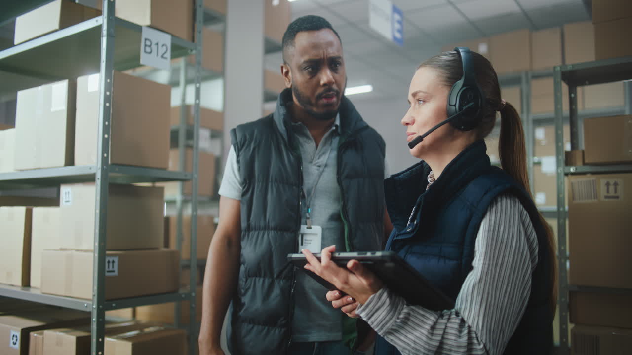 Warehouse Team Discussing Inventory