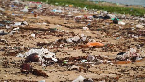 Plastic-Trash-Littering-On-Seashore-In-Son-Hai,-Vietnam