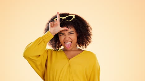 portrait, funny face and loser with a black woman