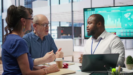 senior couple in a detailed consultation with a financial advisor