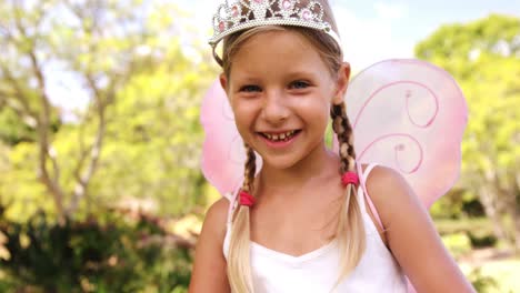 young girl pretending to be a fairy