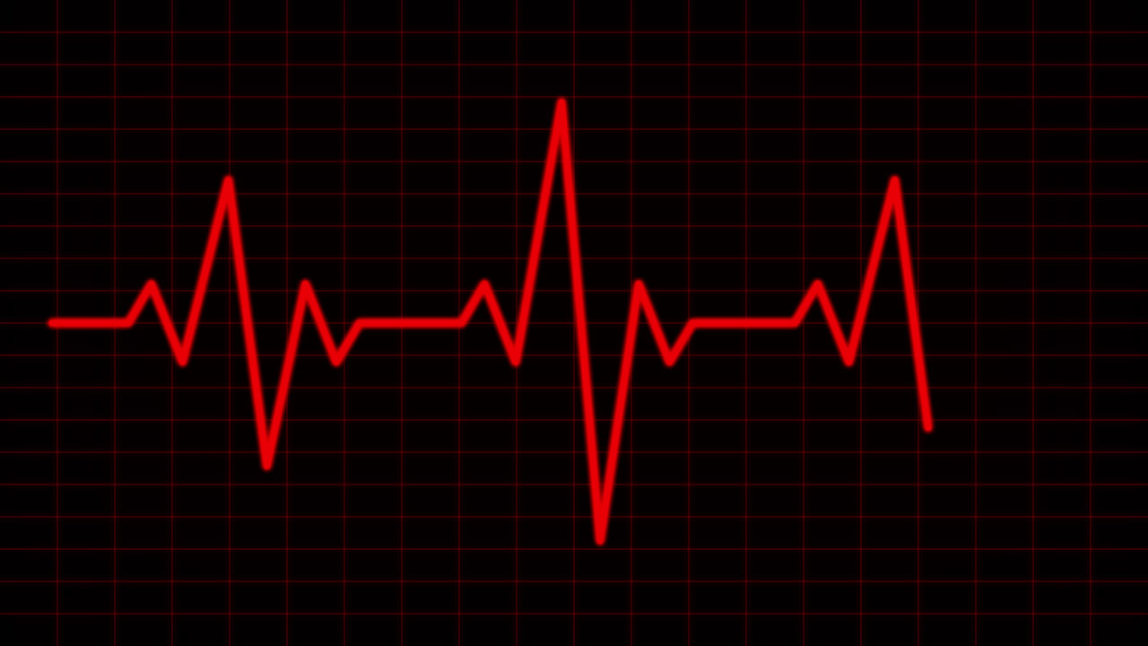 Linea ECG rossa animata del battito cardiaco su monitor a griglia nera