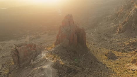 aerial view of volcanic rock formation at sunset