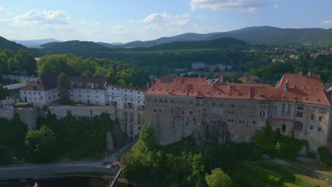 Fabulous-aerial-top-view-flight-Krumlov-Cesky-castle-on-the-hill-castlein-in-czech-republic-in-Europe,-summer-of-2023