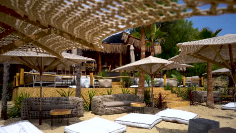 sun beds and parasols by luxury resort at almyra beach