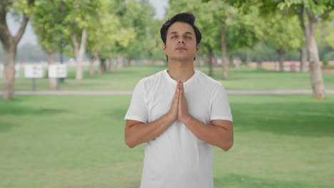 religious indian man praying to god