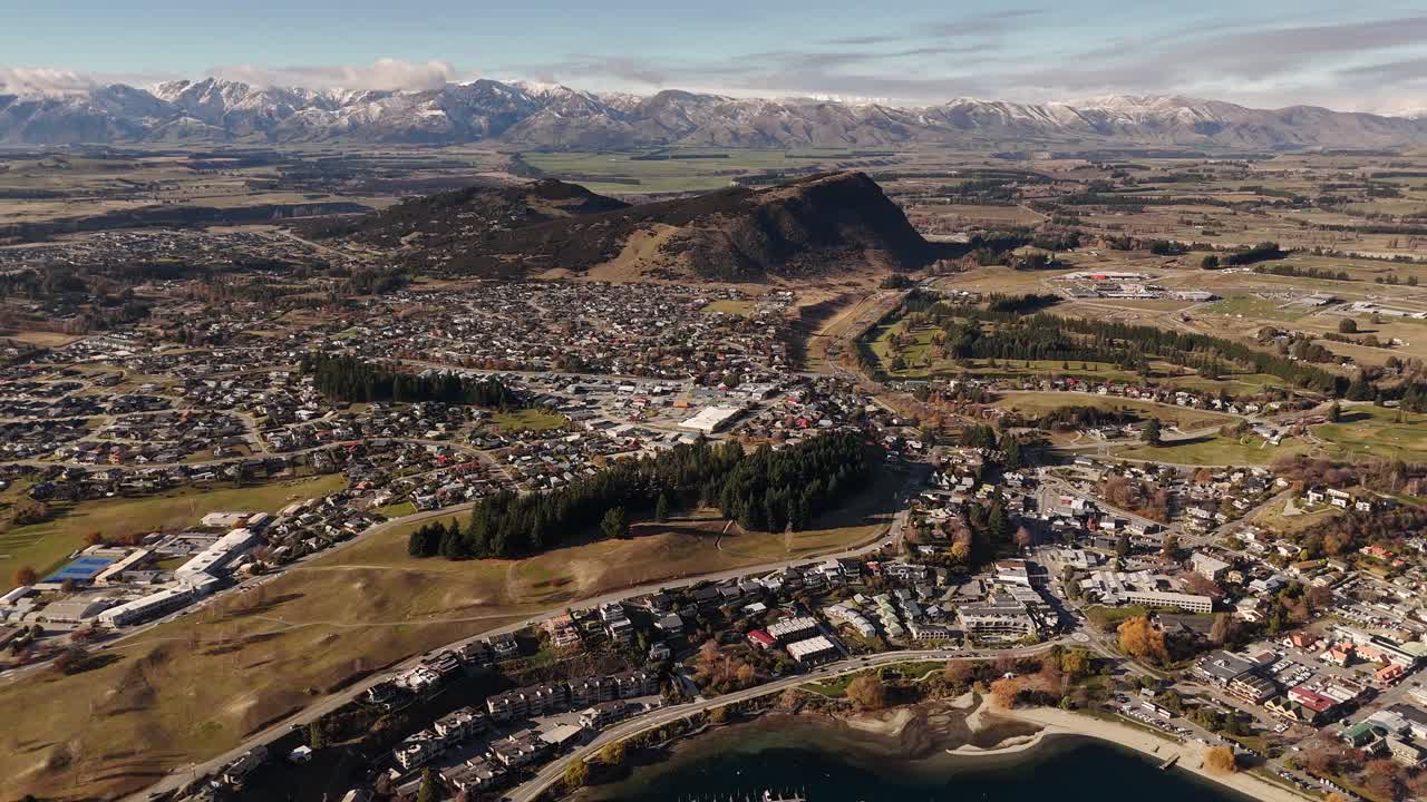 Aerial View of a Town with Mountains in the Background