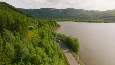 Recreational-Vehicle-Traveling-Across-The-Road-In-Fjord,-Norway