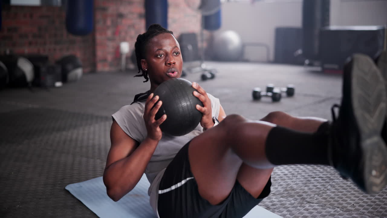 Man Doing Abs Workout in Gym