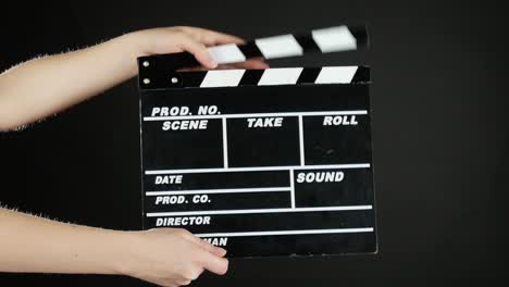 Clapperboard in Hands