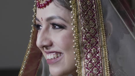 lovely portrait of a happy bride at the indian wedding