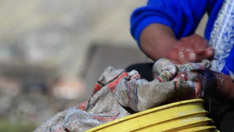 Close-up-of-woman-washing-clothes