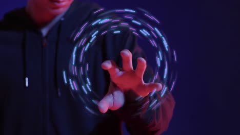 Animation-of-glowing-light-trails-of-data-transfer-over-asian-man-using-vr-headset