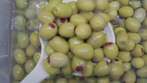display of green stuffed olives
