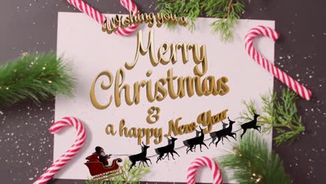 animation of merry christmas text over candy canes