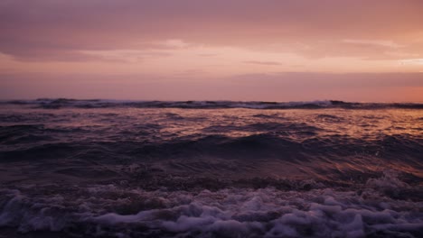 sunset over the ocean waves